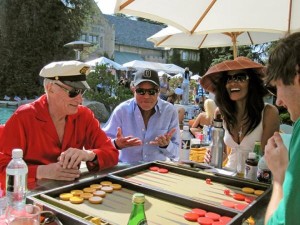 Playboy founder Hugh Hefner (left) loves playing backgammon